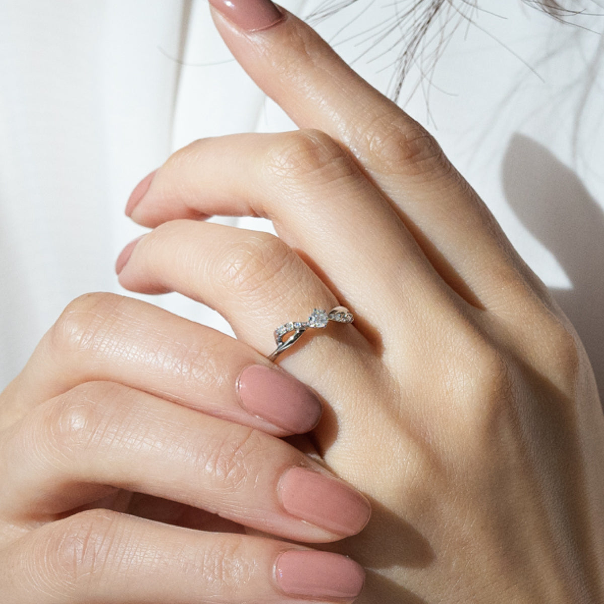 ダイヤモンドリング 0.14ct PT900 プラチナ リボン RIBBON
